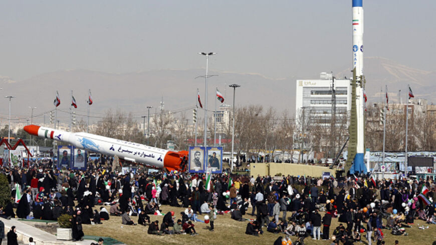 Iran's two-stage Simorgh (Phoenix) satellite carrier(L) and Iranian built Safir-type rocket that is designed to carry a satellite into orbit, are displayed in Tehran as people gather to mark the 45th anniversary of the Islamic revolution on February 11, 2024. Iran marked 45 years since the Islamic revolution with a ceremony on February 11, in which the country's president condemned arch foe Israel and demanded it be expelled from the United Nations. (Photo by AFP) (Photo by -/AFP via Getty Images)